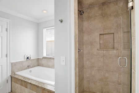 Walk-in tile shower and tub