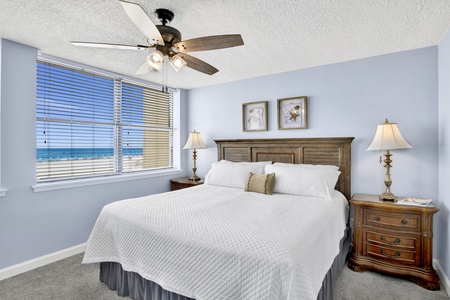The master comes with a king bed, ceiling fan, TV, Gulf views and a private bathroom