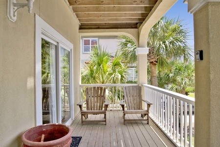 The balcony is covered, offering shade