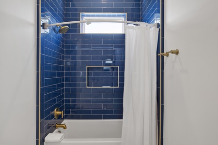 Featuring a tub/shower combo
