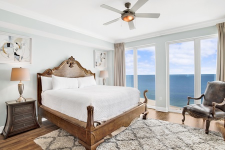 The primary bedroom offers views of the Gulf and balcony access