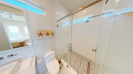 The private bathroom in Bedroom 3 has a large walk-in shower