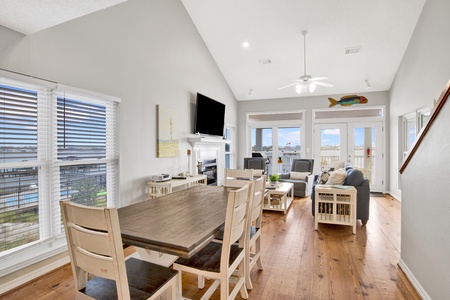 The dining room offers seating for 6 with additional seating at the bar