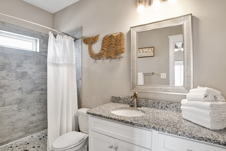 The private master bath has a walk-in shower