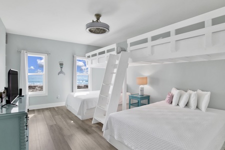 Bedroom 4 has two Twin, loft style beds over two Queen beds, sleeps 6