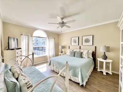 Master bedroom with TV and private bathroom