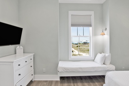 The guest bedroom offers a King bed, Twin bed and TV