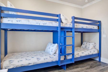Bedroom 6 features 3 sets of twin bunk beds