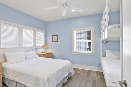 Guest Bedroom 1 has a Queen bed and Twin over Twin bunk