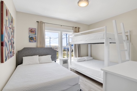 Bedroom 3 offers a Queen bed and Queen bunk bed, sleeping 6