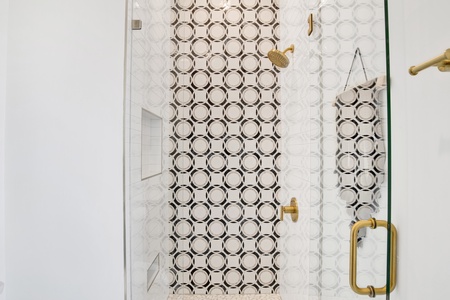 Featuring a walk-in tile shower