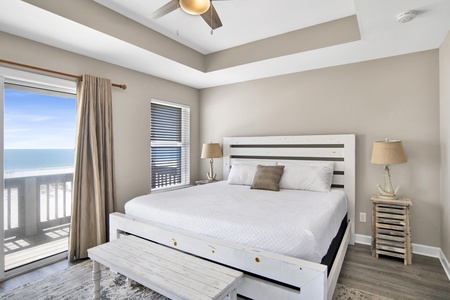 2nd floor primary bedroom with private bathroom and balcony access