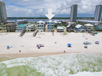 View of the direct beachfront home from the beach