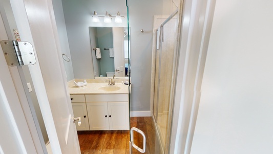 The private bathroom in Bedroom 4 has a walk-in shower