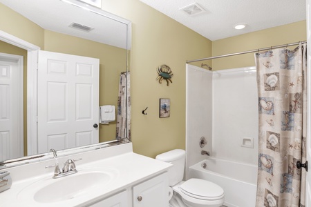 The second bathroom has a hall entrance and a tub/shower combo