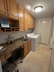 Laundry room and desk area