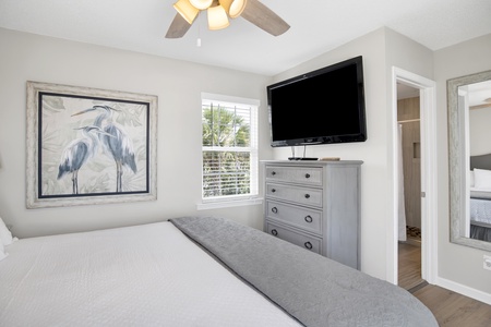 The primary bedroom has a King bed and TV