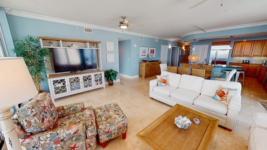 Open concept with comfortable seating and large television
