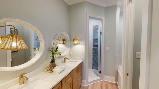 There is a double vanity and a soaking tub ( to the right, not pictured)