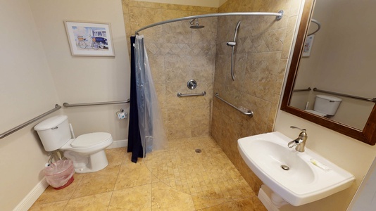 Private ADA compliant bathroom in Bedroom 6