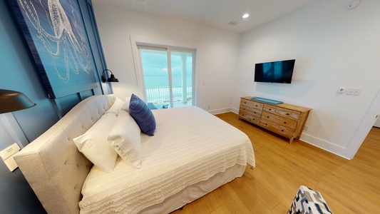 The master bedroom is on the 2nd floor featuring a king bed, private bathroom, TV, Gulf views and balcony access