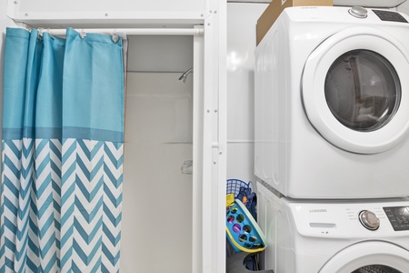 The laundry room also has a laundry sink, toilet and shower