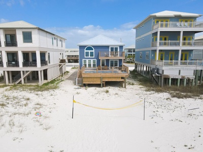 View of the home while standing on the beach