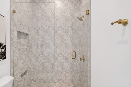 Featuring a walk-in tile shower
