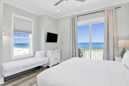 The guest bedroom, located on the 2nd floor with a private bathroom, King bed, Twin bed, TV and balcony access