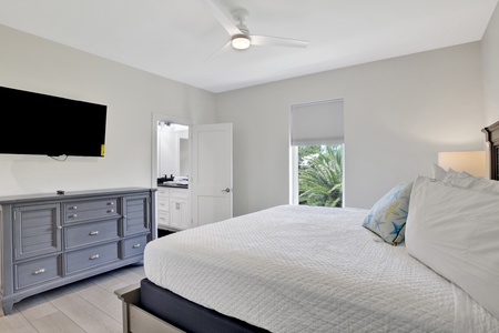 Bedroom 4 features a TV, ceiling fan and an attached Jack-n-Jill bathroom