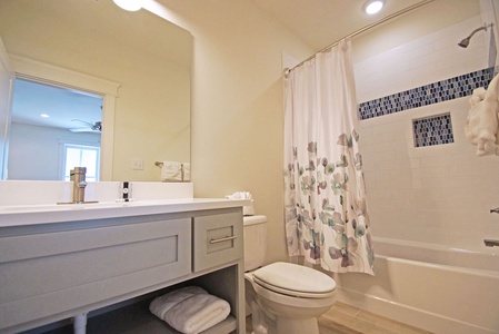 The Private bath in Bedroom 4 has a tub/shower combo