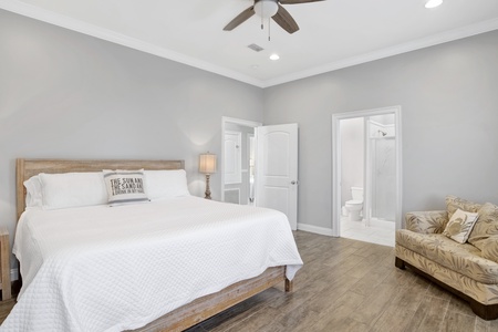 1st floor Master bedroom with a king bed and a TV