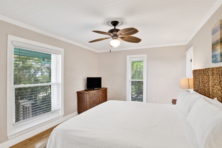 The primary bedroom sleeps 2 guests and has a TV