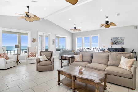 2nd floor living room with comfortable couches and open concept area