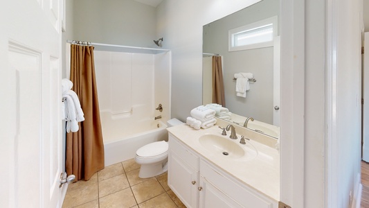 Private bathroom in Bedroom 3 with a tub/shower combo