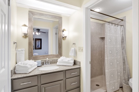 The private bathroom in bedroom 2 has a walk-in shower