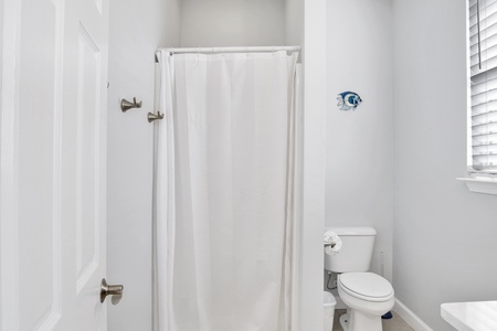 There is a walk-in shower in the bathroom  in Bedroom 4