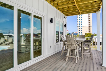 The covered balcony offers additional dining space