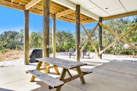 Shaded picnic area under the home