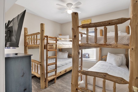 Bedroom 3 comes with a ceiling fan and a TV