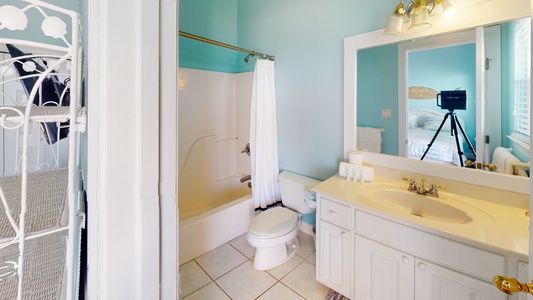 Bedroom 6 bathroom featuring a shower/tub combo