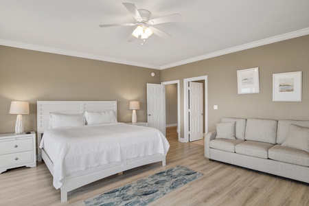 This bedroom offers a King bed and sleeper sofa