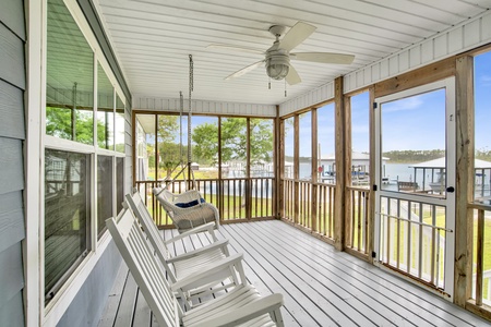 Screened in porch with a swing