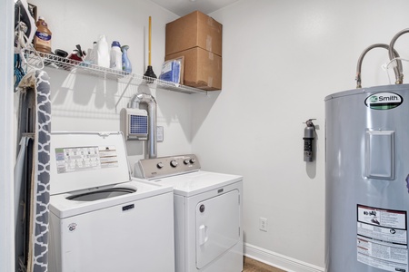 Laundry area with full size washer/dryer
