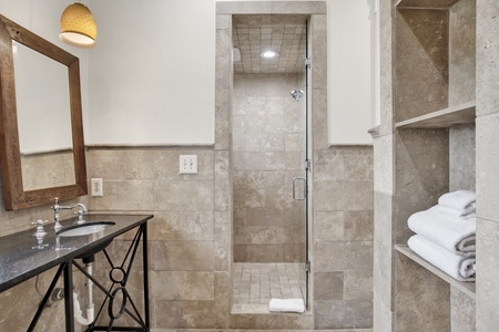 Walk-in shower in the private master bathroom
