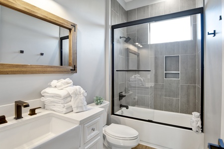 1st floor hall bathroom with a tub/shower combo