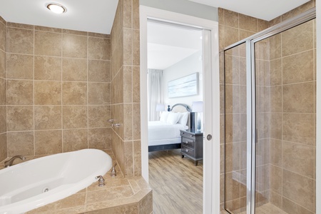 And features a walk-in shower and jetted tub