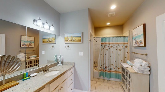 Private Master bath with a tub/shower combo