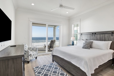 Bedroom 3 is on the 2nd floor with a king bed, TV, Gulf views and balcony access