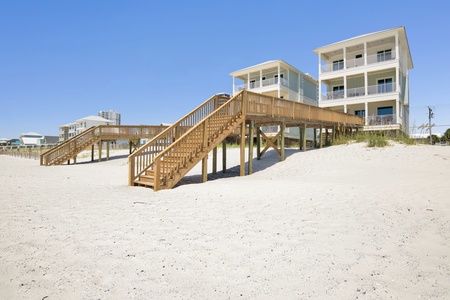 Private beach walkover with stairs down to the sand